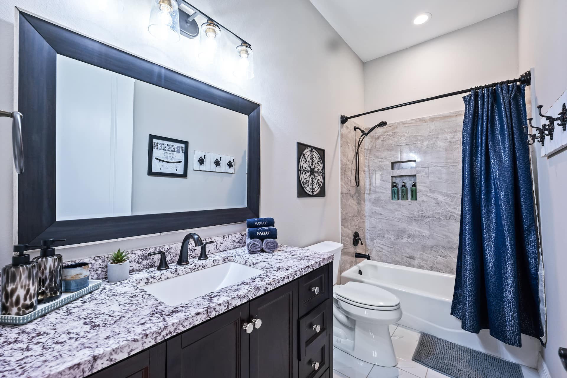 Guest bathroom with tub and shower