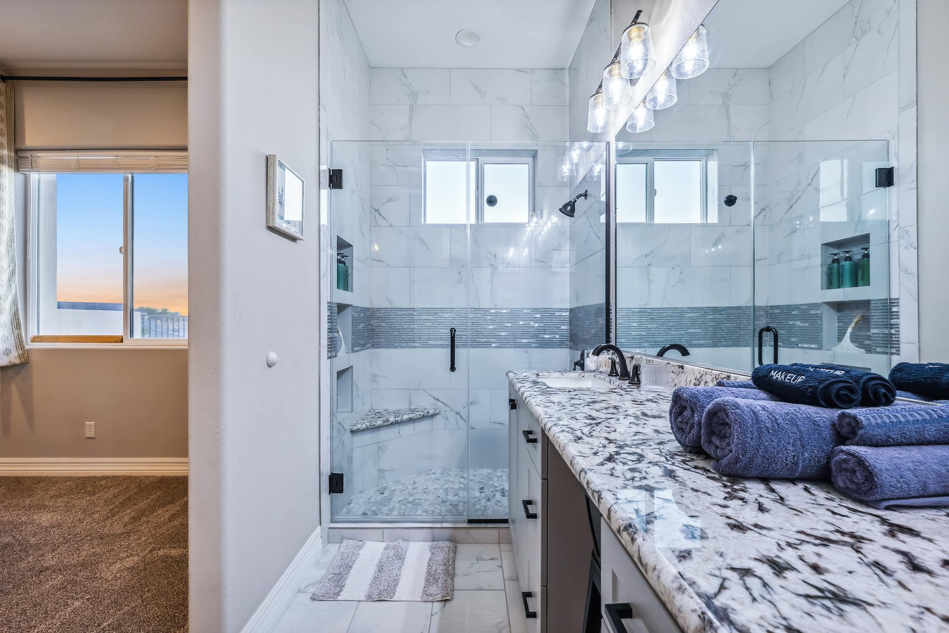 Marble shower with dual vanity