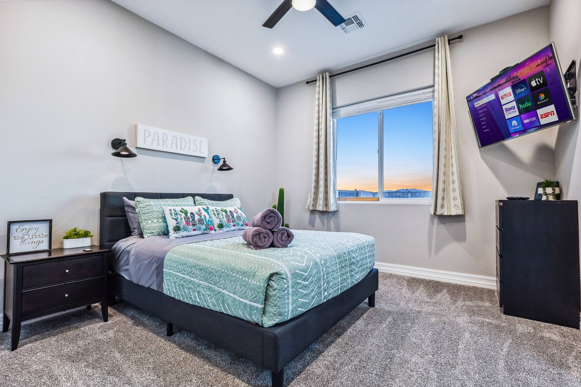 Queen bedroom with Roku TV