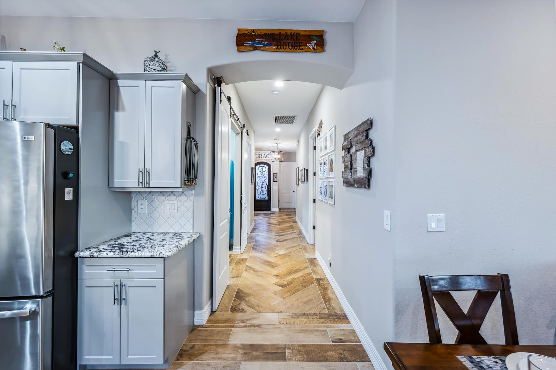 Hallway with herringbone floors