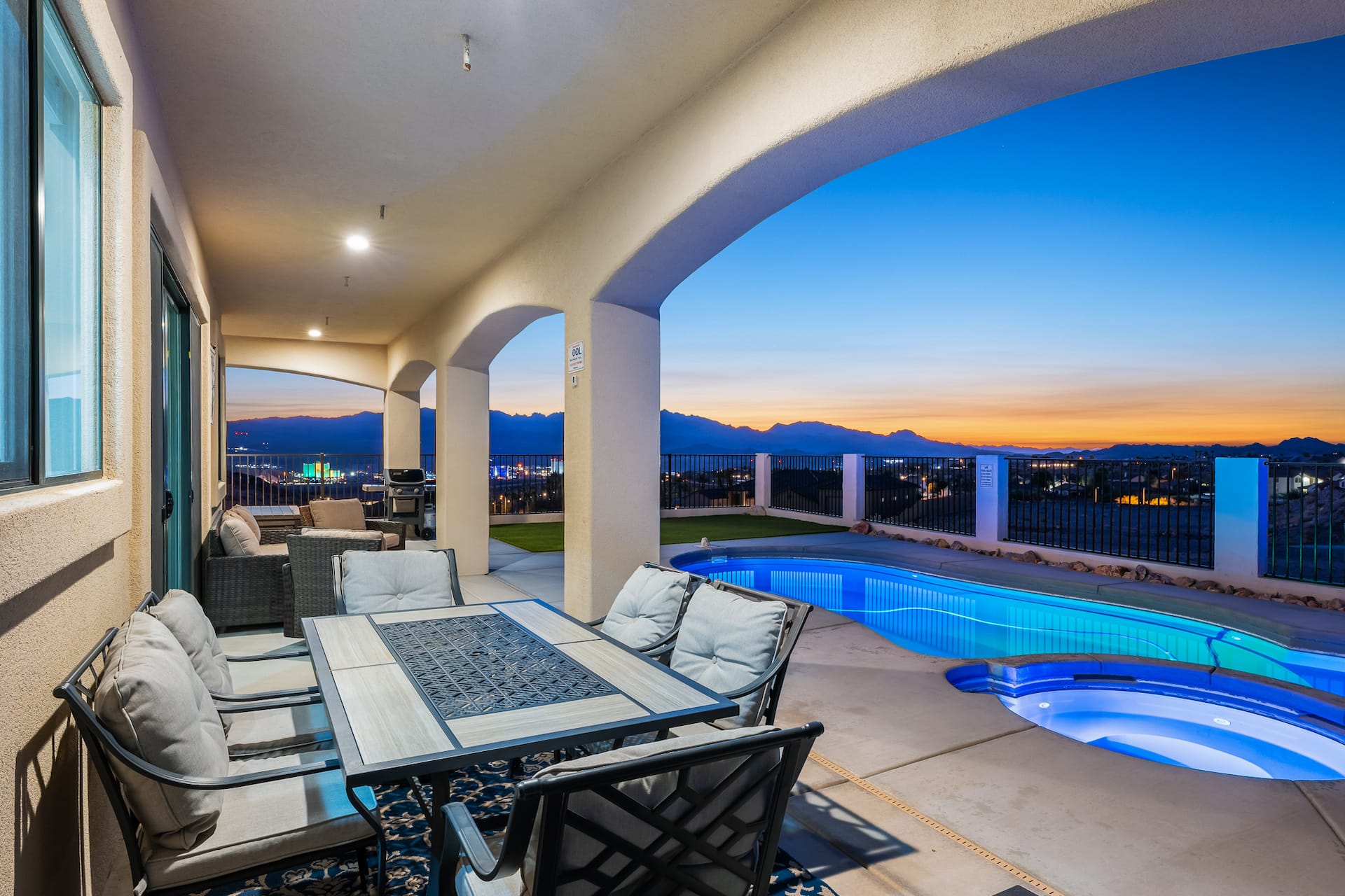 Covered patio dining with Laughlin Strip views